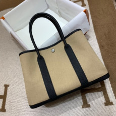 에르메* 가든파티30 트렌치 캔버스 블랙 네곤다