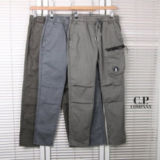c.p company 씨피컴퍼니 워싱 지퍼포켓 렌즈 슬림팬츠